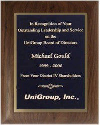 Walnut plaques with black brass engraving plate.