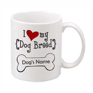 White ceramic mug imprinted with "I heart my dog breed" and dog name
